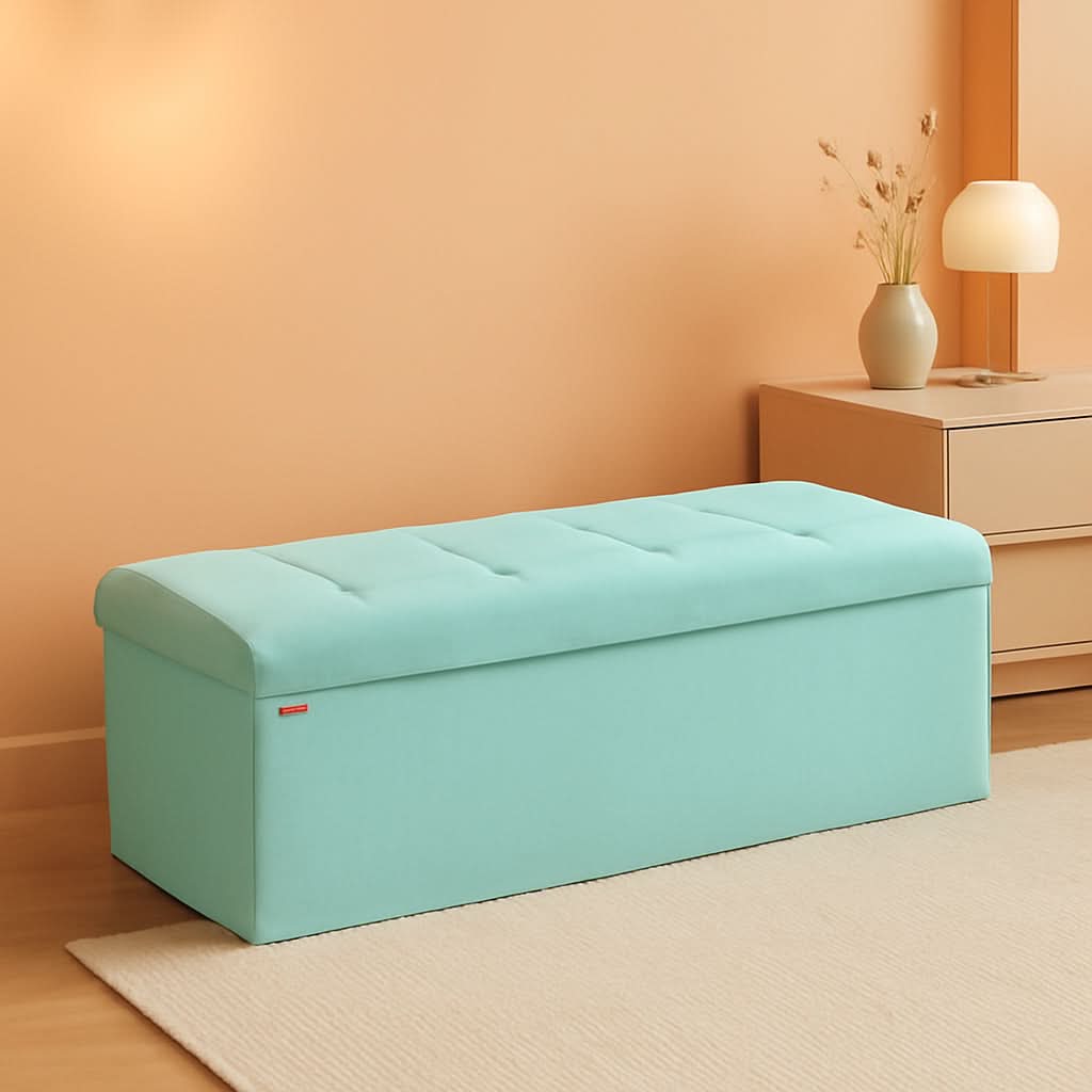 Moonlight green foldable corduroy storage ottoman bench with tufted lid and divided interior.