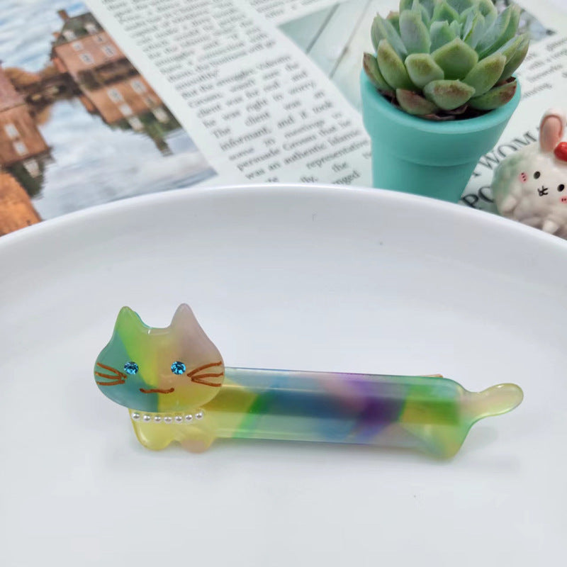 Hand-painted cat shaped eco-friendly cellulose acetate hair clip with pearl necklace and glass rhinestones. — view 4