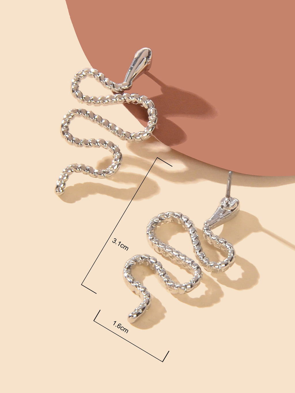 Silver snake stud earrings with intricate gothic serpent design for alternative fashion styles — view 3