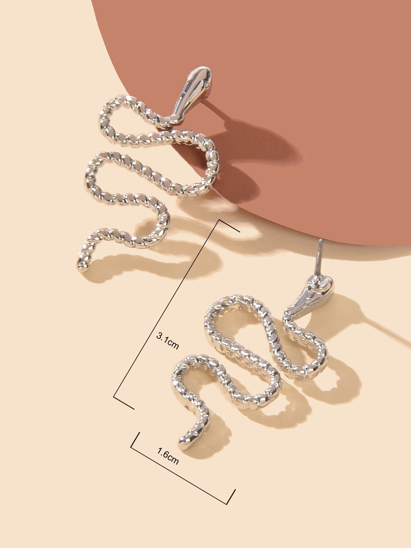 Silver snake stud earrings with intricate gothic serpent design for alternative fashion styles — view 3