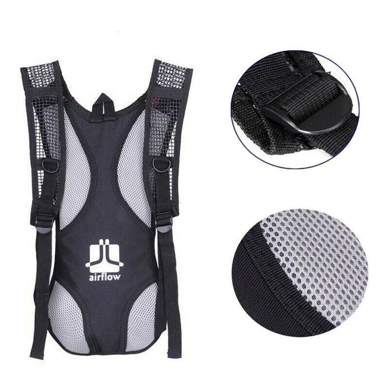 Lightweight nylon hydration backpack with two liter water bladder and adjustable shoulder straps — view 5