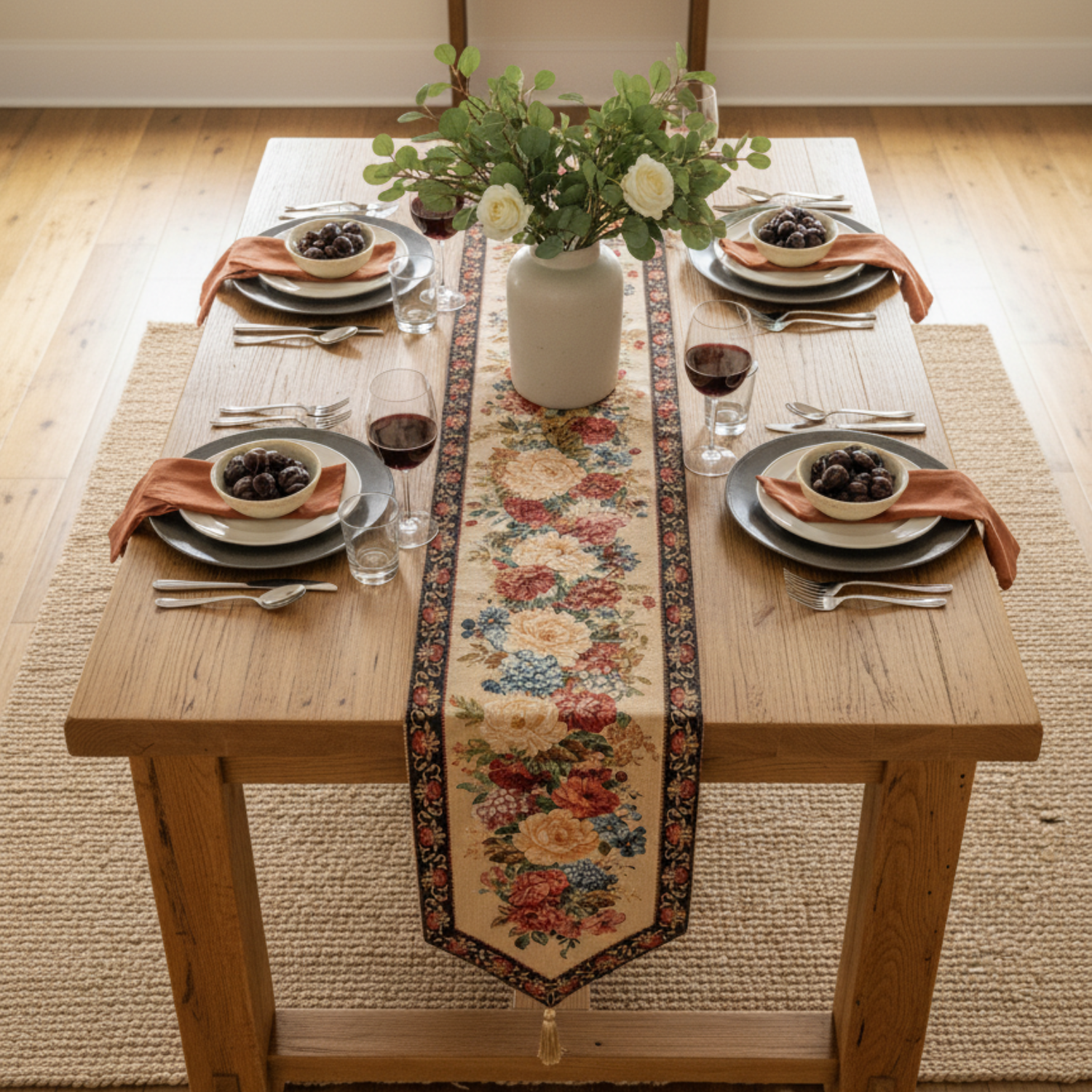 Colorful woven floral table runner with rustic country design on a wooden dining table surface — view 3