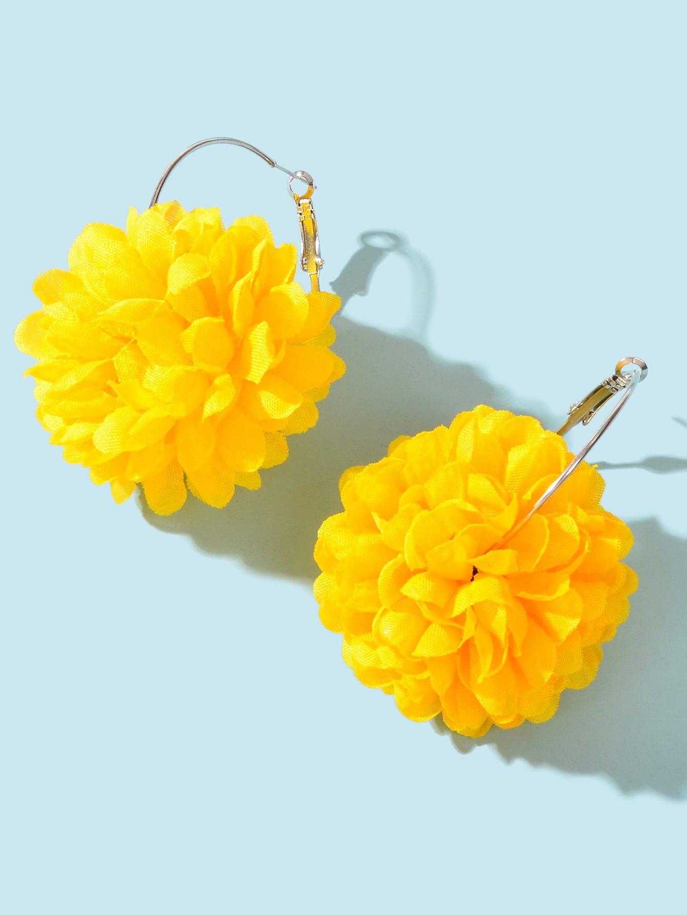 Yellow and hot pink chiffon blossom floral dangle hoop earrings on a clean background — view 3