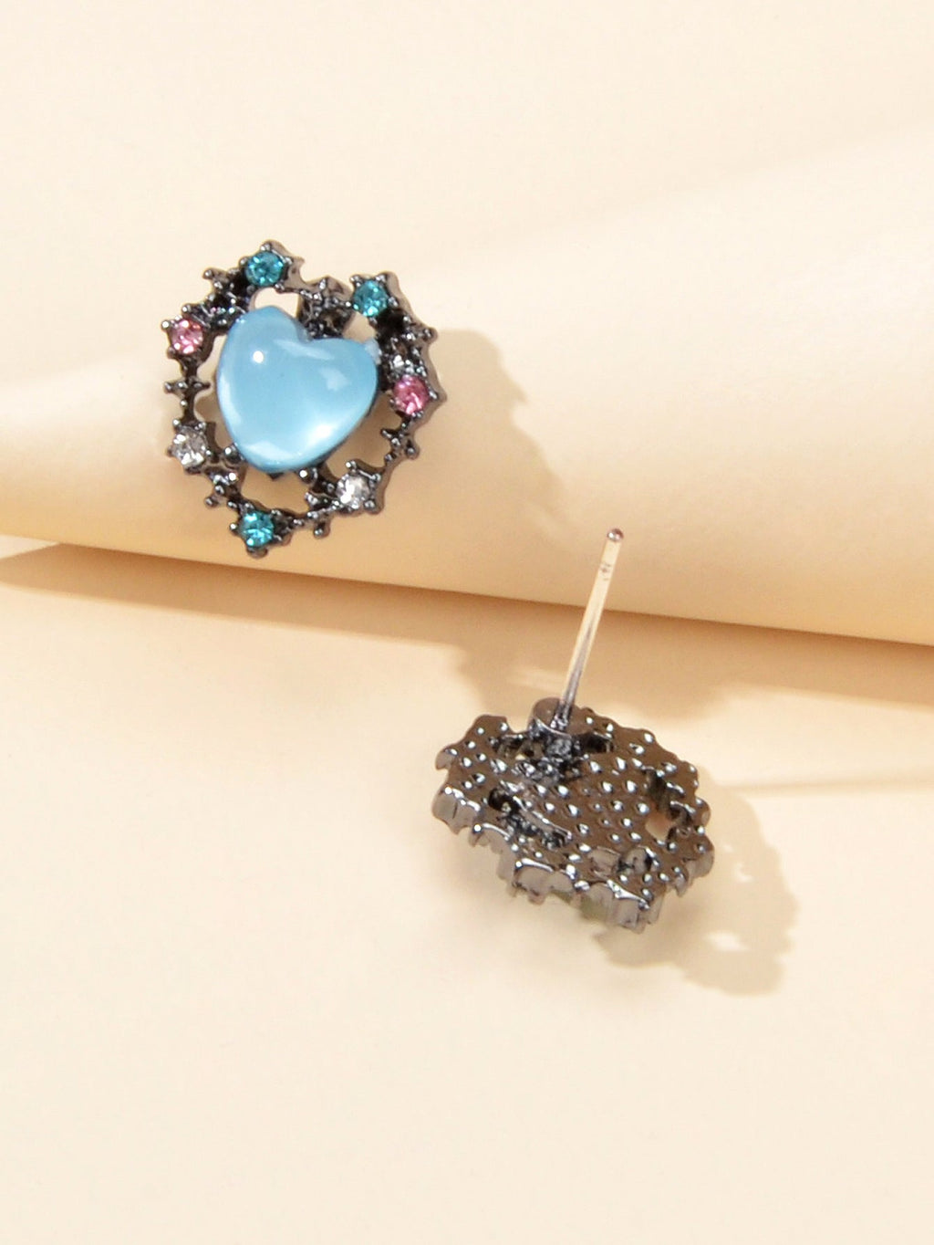 Retro blue opal heart stud earrings with colorful rhinestone halo on a clean background — view 3