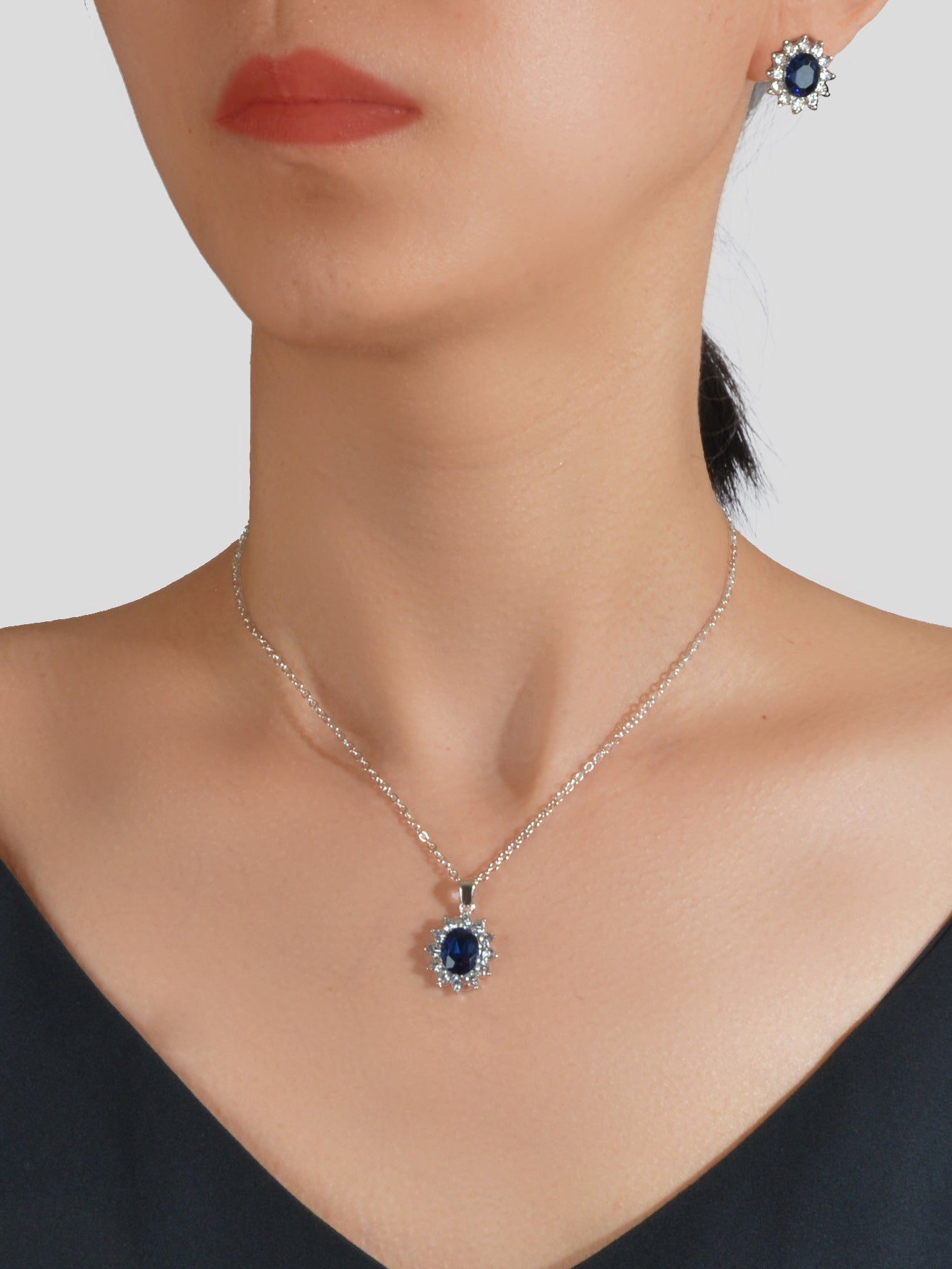 Blue simulated gemstone jewelry set with adjustable charm necklace and matching stud earrings for women — view 3