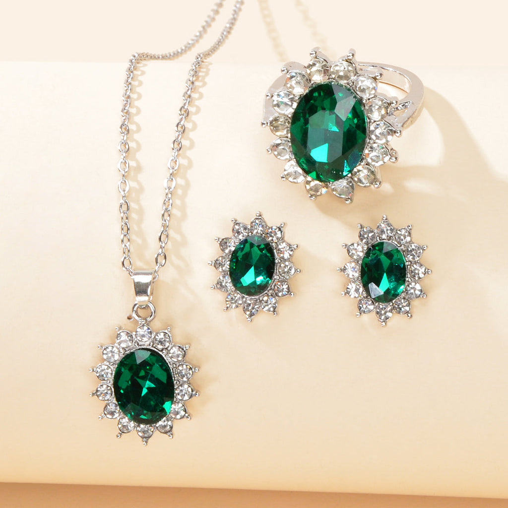 Luxury three piece crystal floral wedding jewelry set with necklace, stud earrings, and matching finger ring — view 3