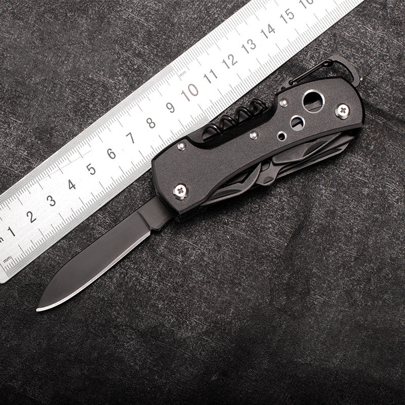Mysterious black folding multi-tool pocket knife with stainless steel blades and outdoor survival tools. — view 3