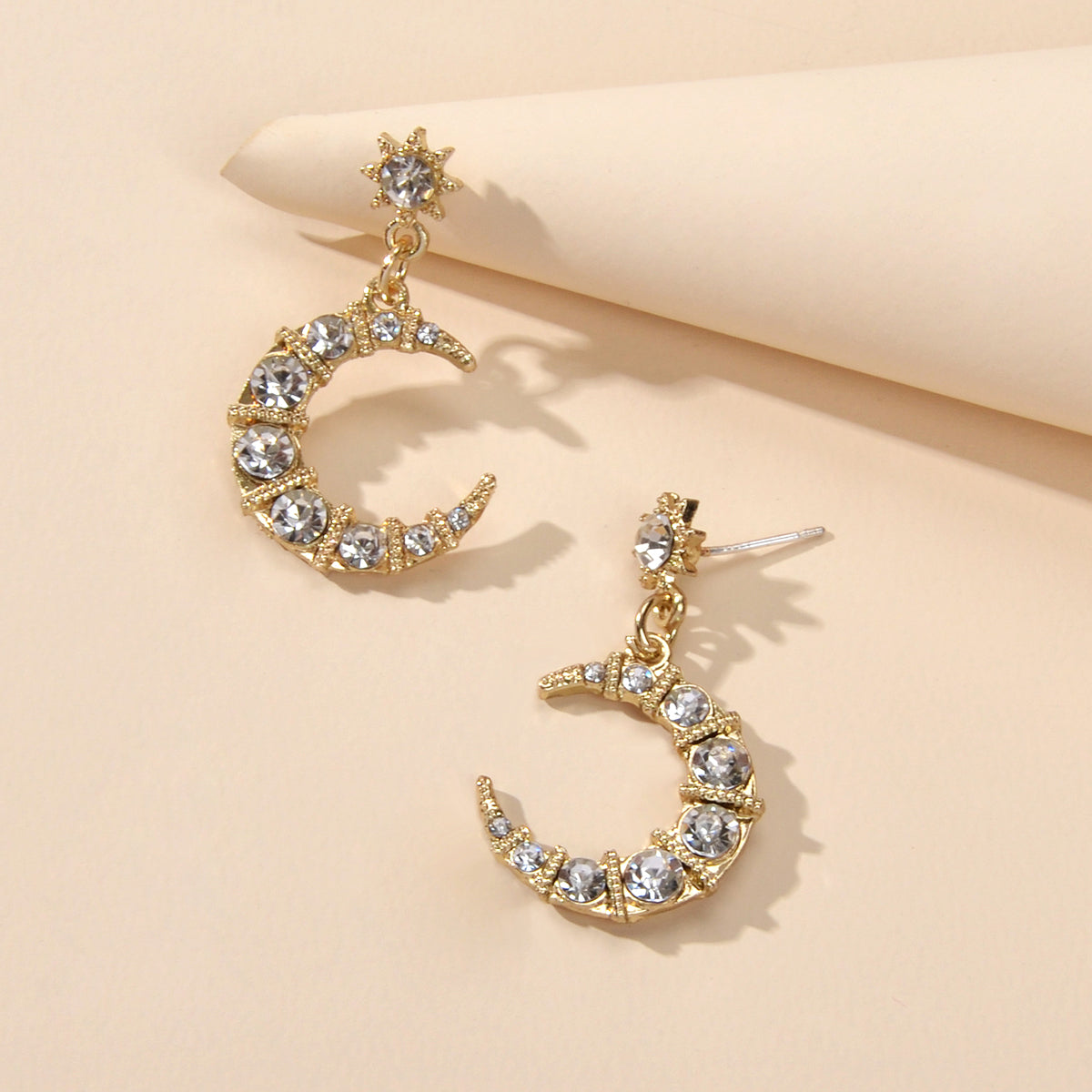 Textured luxury rhinestone star and moon dangle earrings for weddings and evening wear — view 3