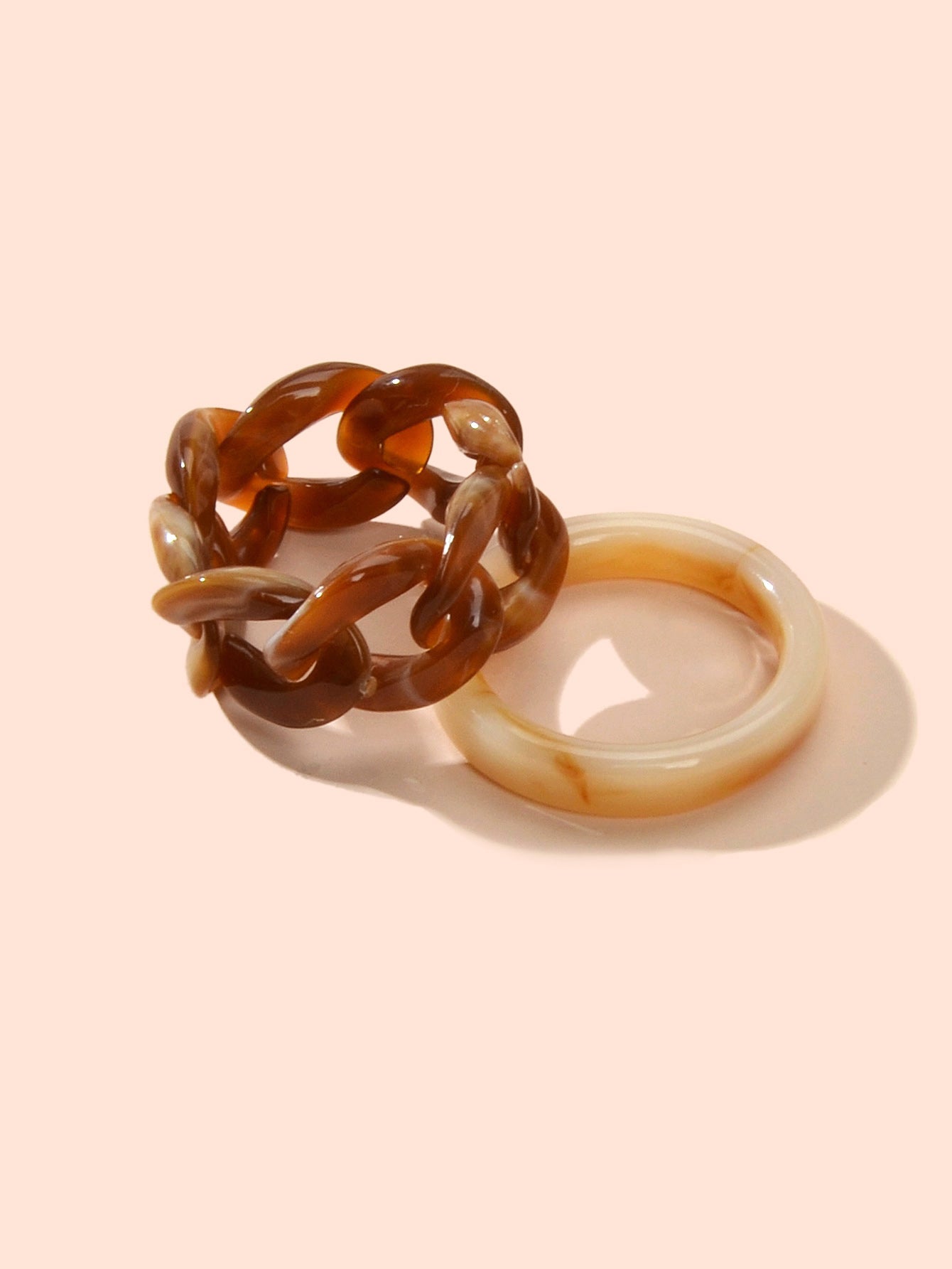 Two piece geometric stackable midi ring set in vibrant blue and earthy brown colors — view 3