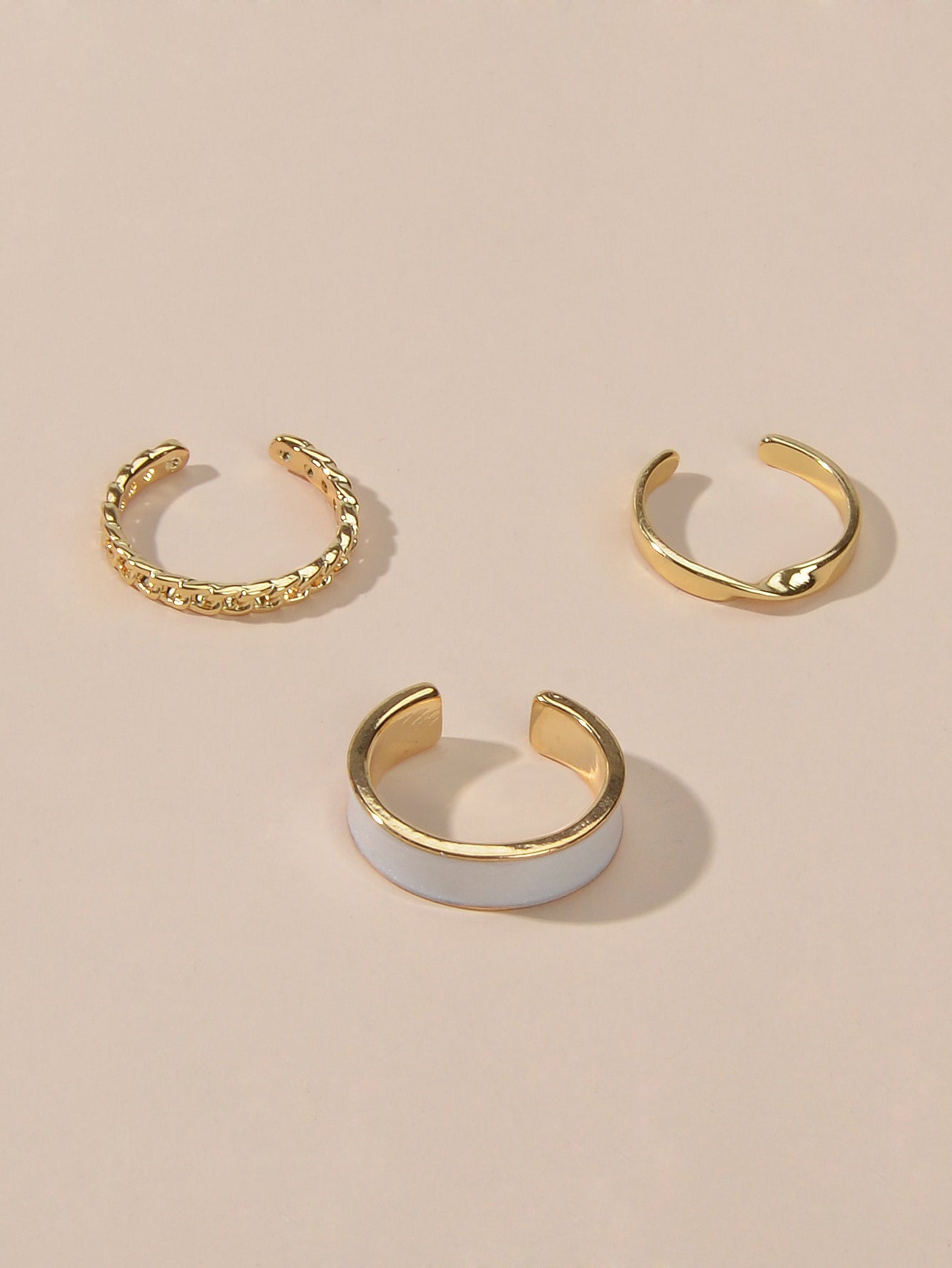 Three piece retro stackable white enamel midi knuckle ring set displayed together — view 3