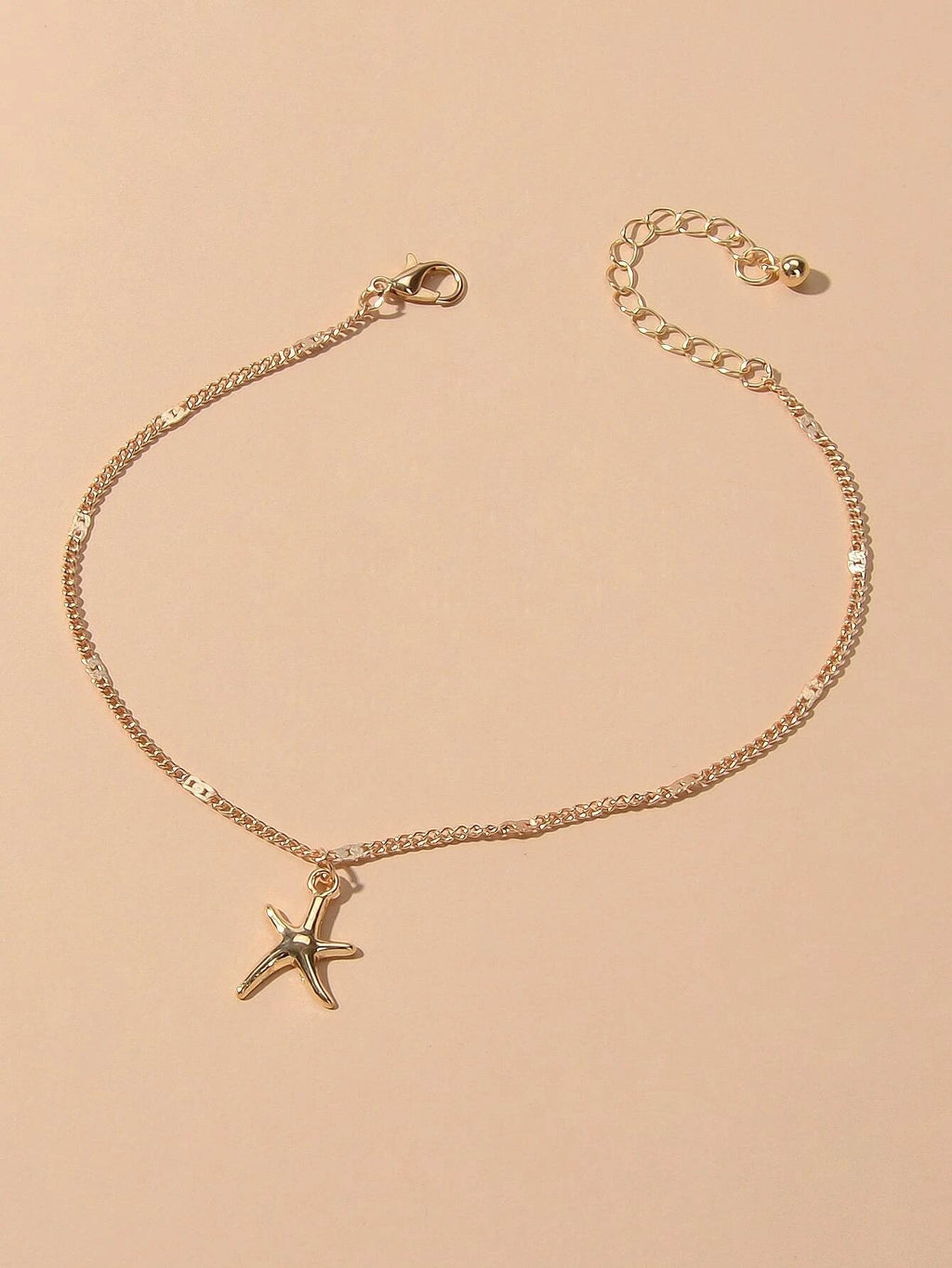 Silver and gold tone starfish charm boho anklet on a delicate adjustable foot chain — view 3
