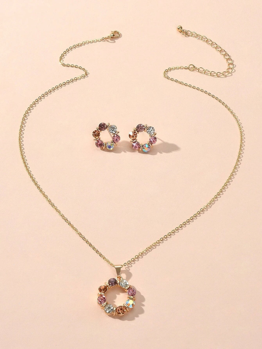 Colourful rhinestone flower jewellery set with an adjustable charm necklace and matching 1.7cm stud earrings — view 3