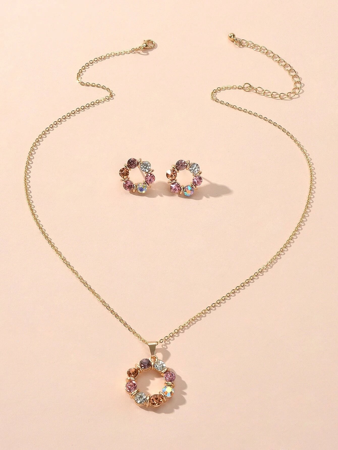 Colourful rhinestone flower jewellery set with an adjustable charm necklace and matching 1.7cm stud earrings — view 3