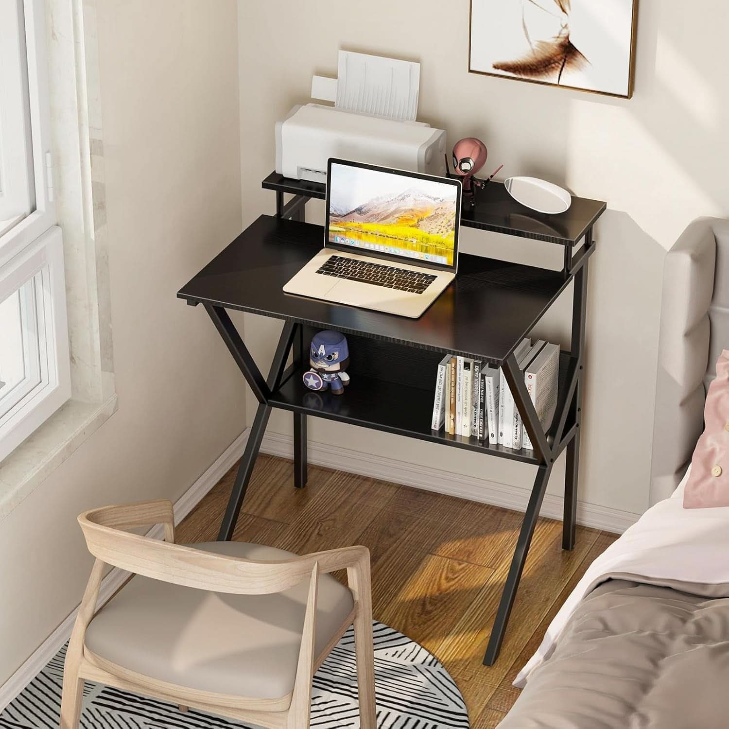 Compact 27.5-inch black computer desk with ergonomic monitor stand, lower storage shelf, and metal frame — view 2