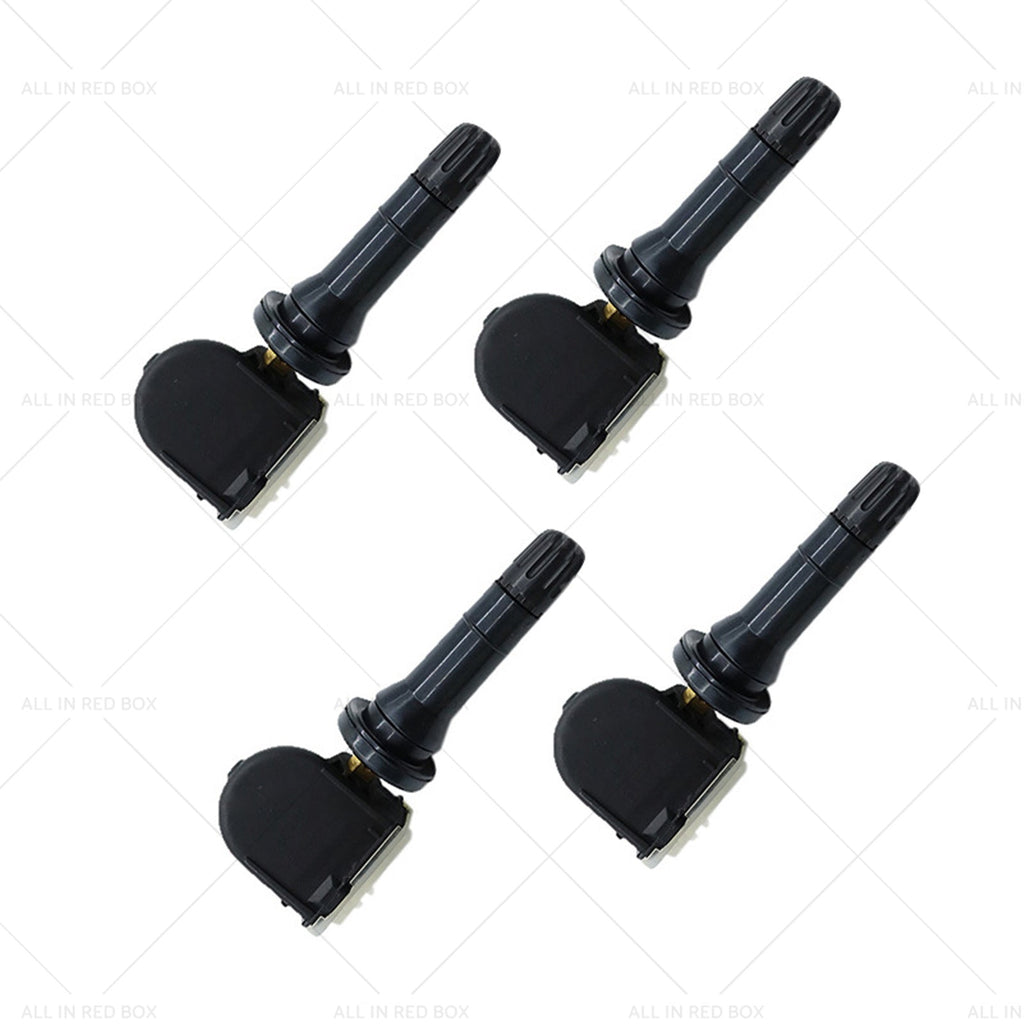 Four black metal and plastic tire pressure monitoring sensors for vehicle wheels — view 3
