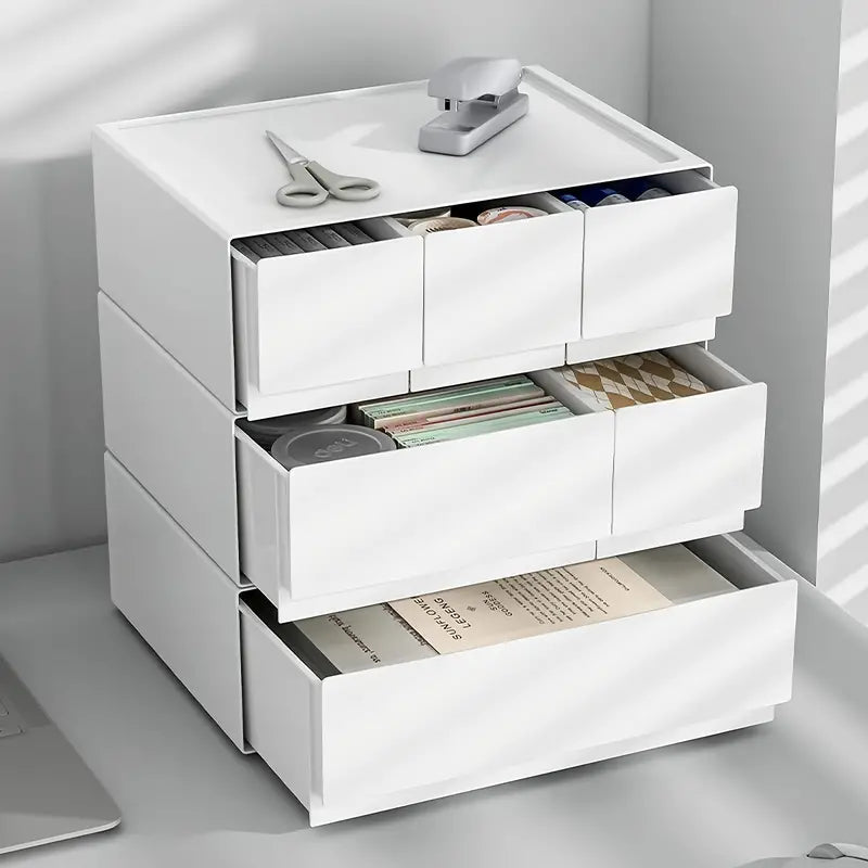 Stackable white plastic bedside drawer organizer with multiple storage layers for bedroom essentials — view 3