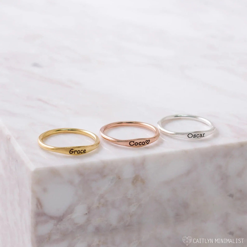 Delicate personalized tiny name ring in 18k gold with a smooth minimalist band — view 2