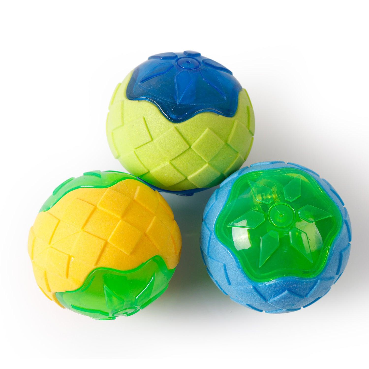 Glowing audible dog toy ball in bright plastic with studded teeth-grinding texture for fetch play. — view 2