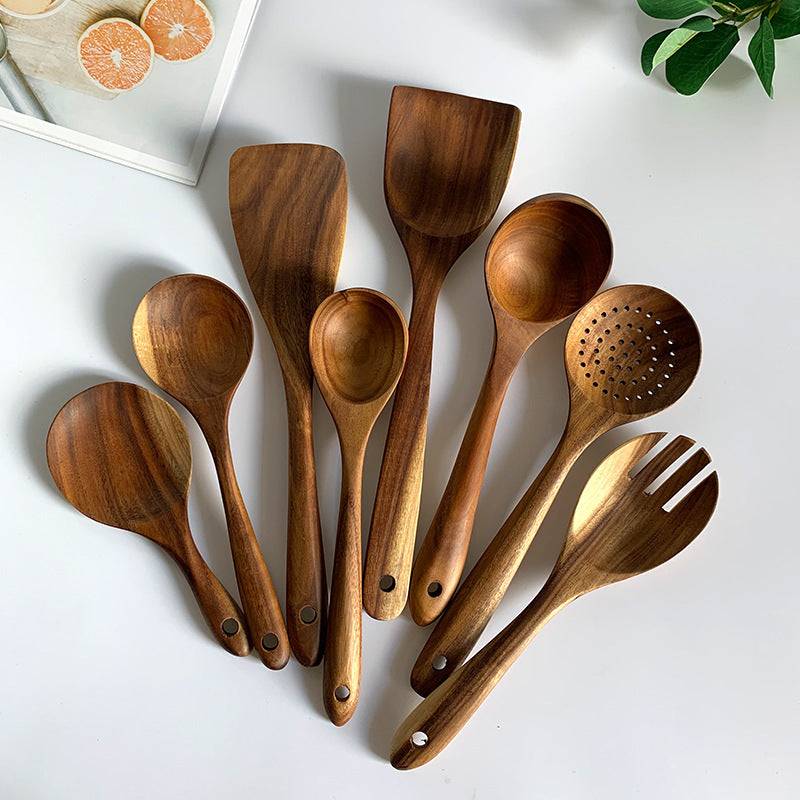 Natural teak wood kitchen utensil set including spoon, ladle, and turner with smooth wood grain — view 2