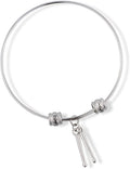 Silver tone stainless steel charm bangle featuring a detailed miniature drumstick pendant.