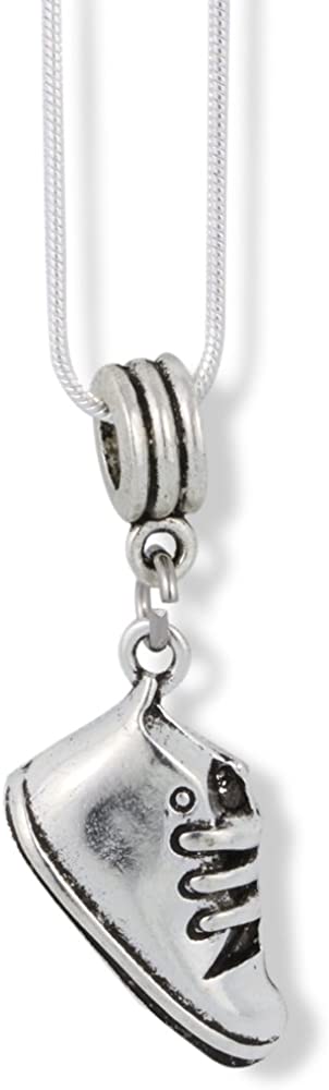 Silver-plated baby shoe sneaker charm necklace on a smooth matching snake chain