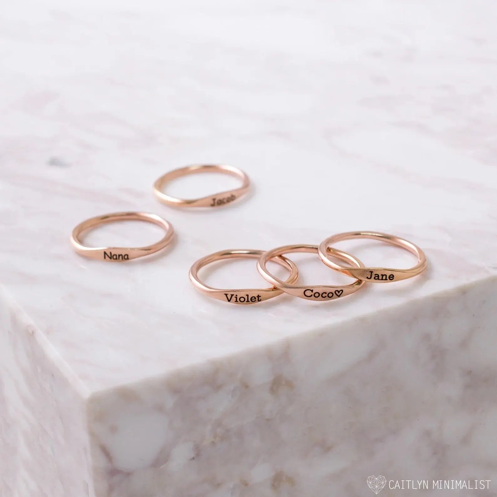 Delicate personalized tiny name ring in 18k gold with a smooth minimalist band — view 4