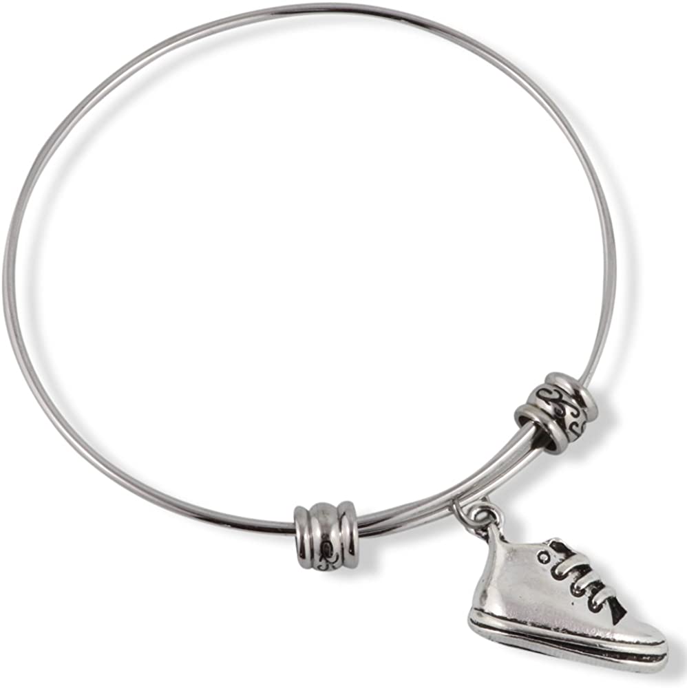 Silver stainless steel adjustable bangle bracelet featuring a detailed sneaker baby shoe charm.
