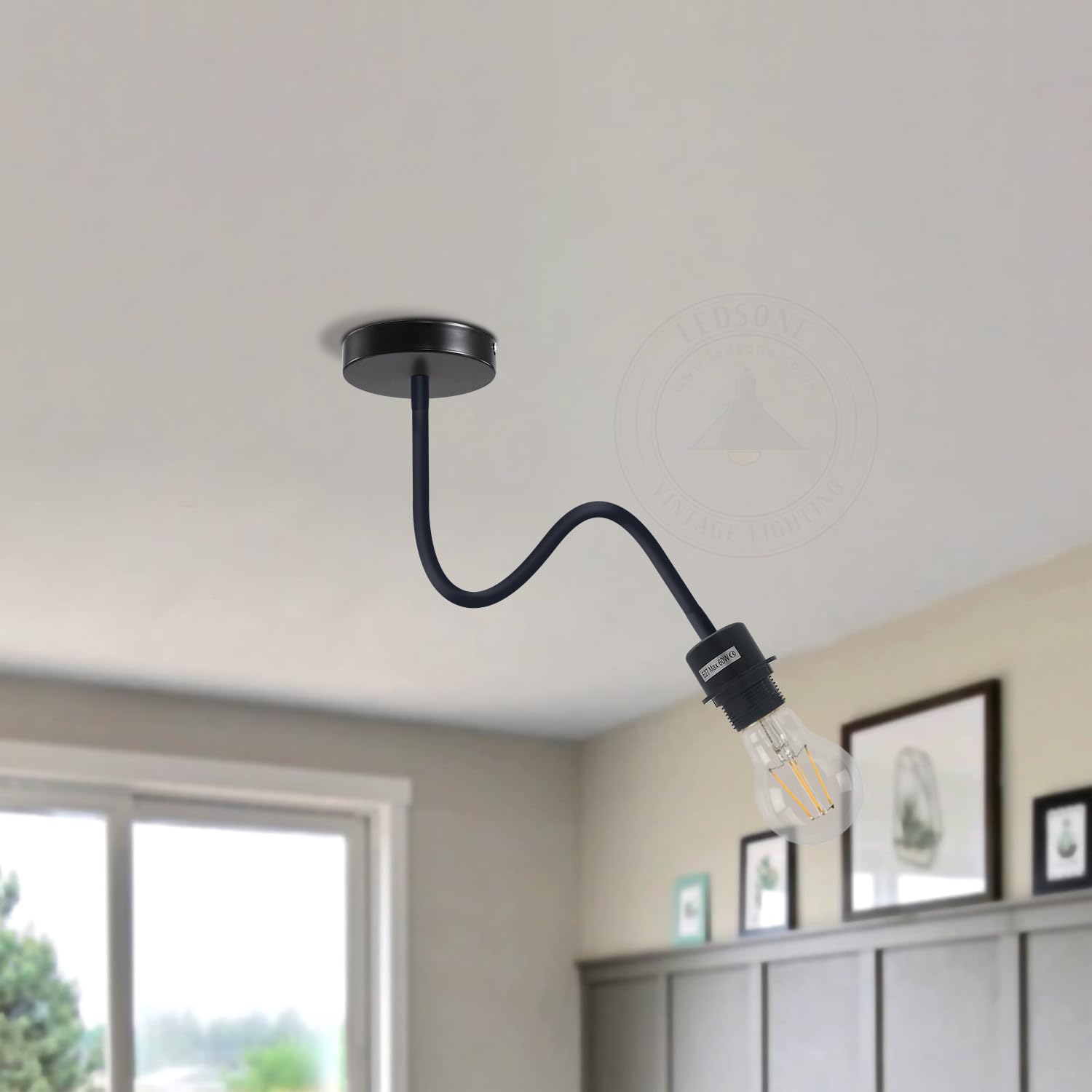 Flexible swan neck reading light in matte black, modern wall sconce fixture with adjustable E27 base.