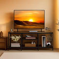 Rustic brown 47.2 inch TV stand with open mesh shelving side hooks and a charging station