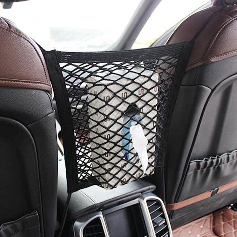 Black polyester universal car seat storage net and pet barrier suspended between two front seats