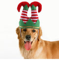 Festive striped pet Christmas hat and clown headgear with an adjustable strap for dogs.