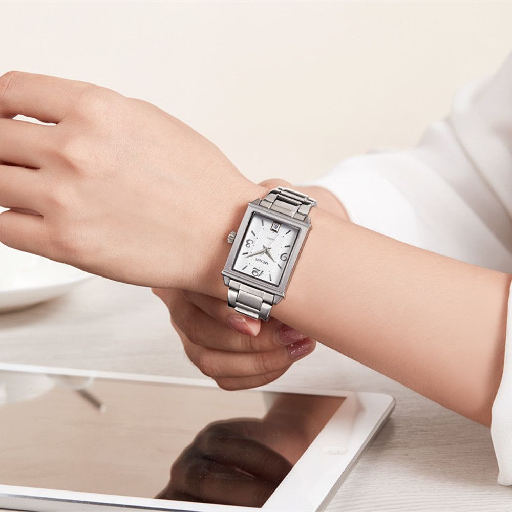 Elegant women's quartz wristwatch with polished steel band, zinc alloy case, and classic analog dial — view 3