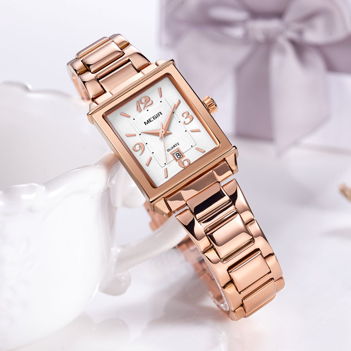 Elegant women's quartz wristwatch with polished steel band, zinc alloy case, and classic analog dial — view 4