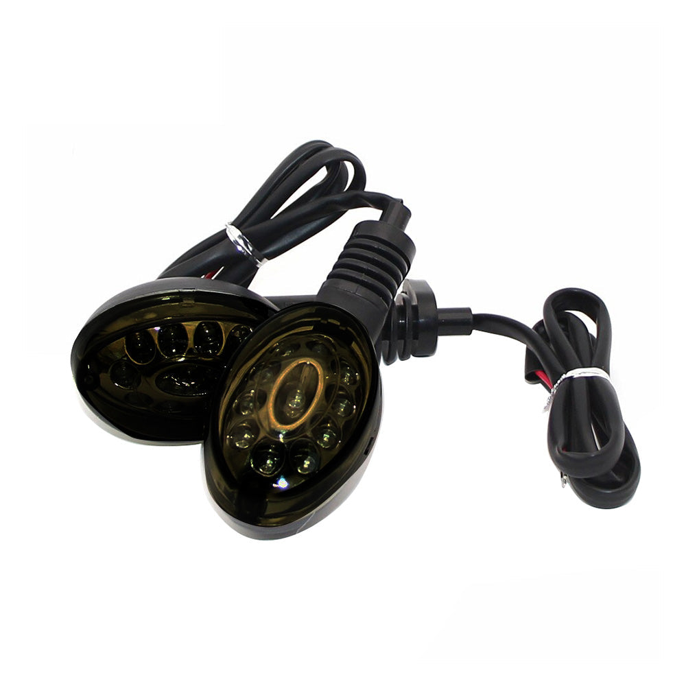 Smoke lens amber LED motorcycle turn signal indicator lights with connecting cables on white background — view 2