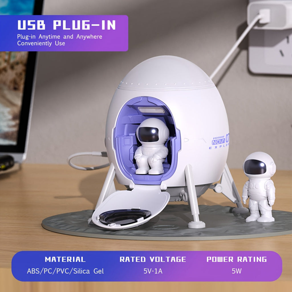 Astronaut galaxy projector night light made of white plastic featuring magnetic figures and lunar mat — view 2