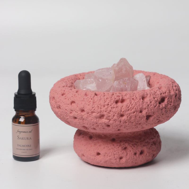 Pink Moon Diffuser with Sakura fragrance oil bottle, elegant home aromatherapy accent