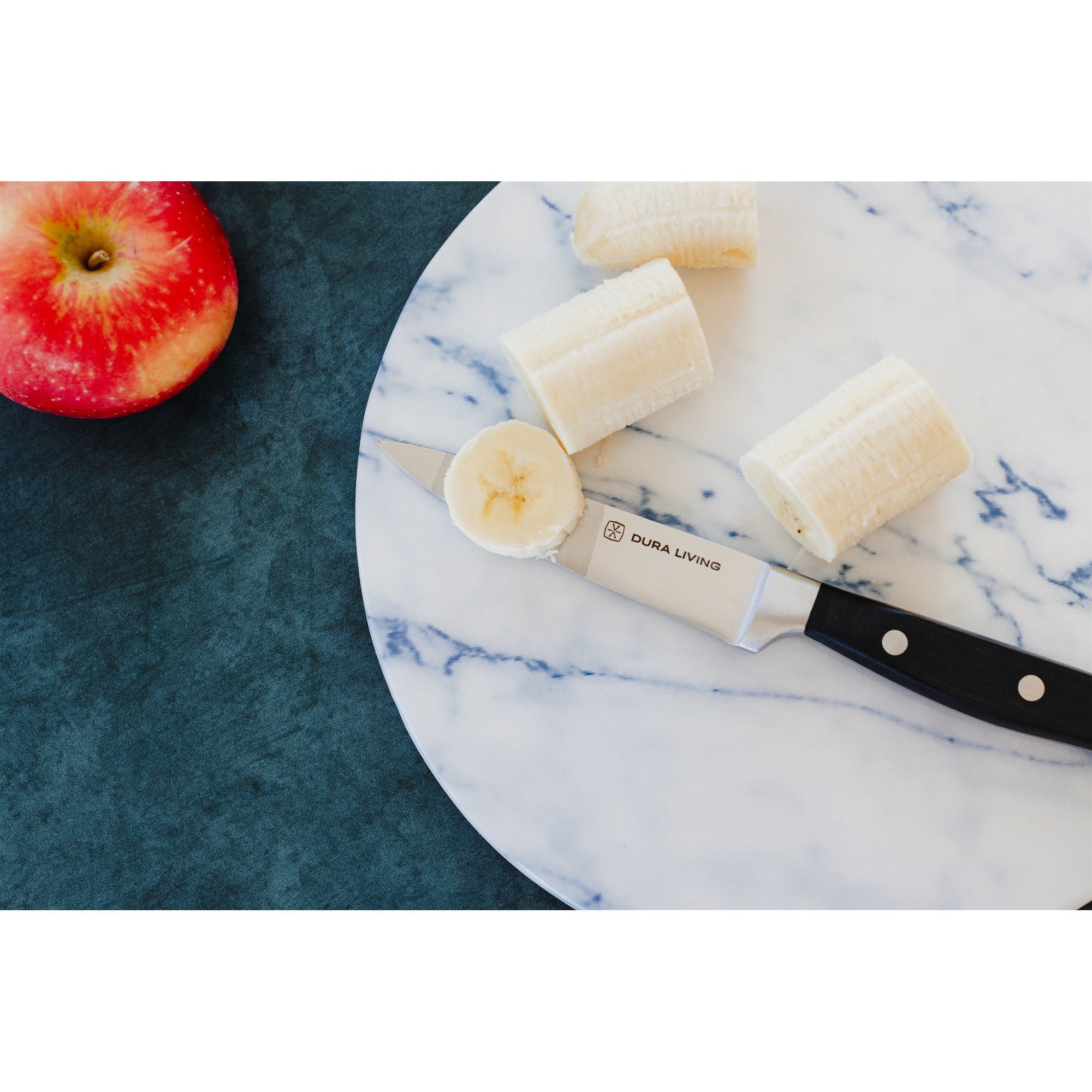 Superior 3.5 inch paring knife with black ergonomic handle and high-carbon German steel blade — view 2