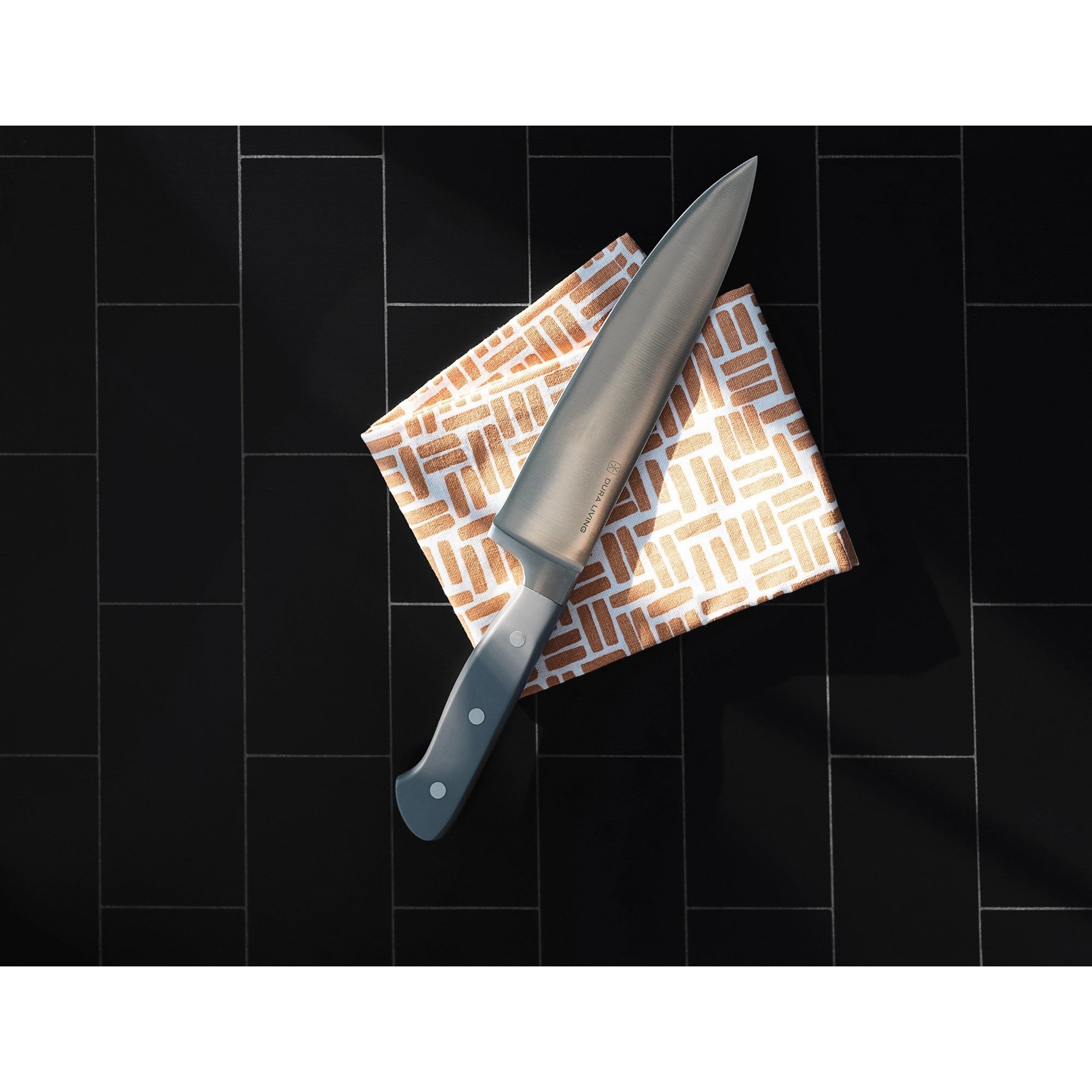 Superior 8-inch chef knife with gray ergonomic handle and high-carbon German steel blade. — view 3