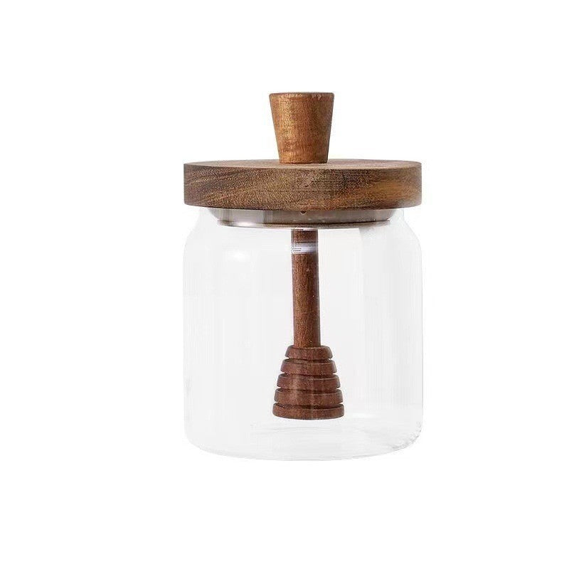 Clear high borosilicate glass honey jar with a natural wooden lid and built in dipper — view 2
