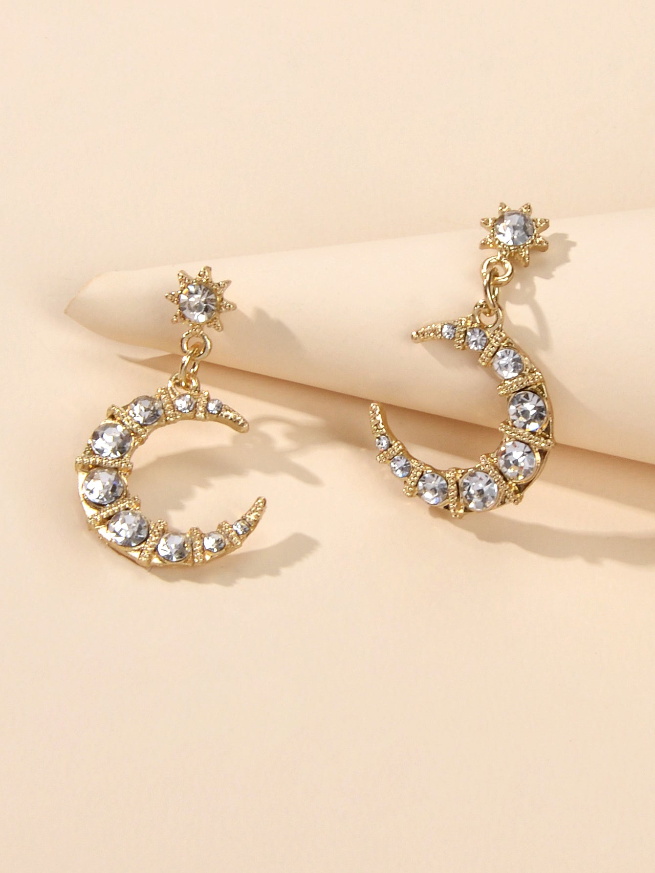Textured luxury rhinestone star and moon dangle earrings for weddings and evening wear — view 4