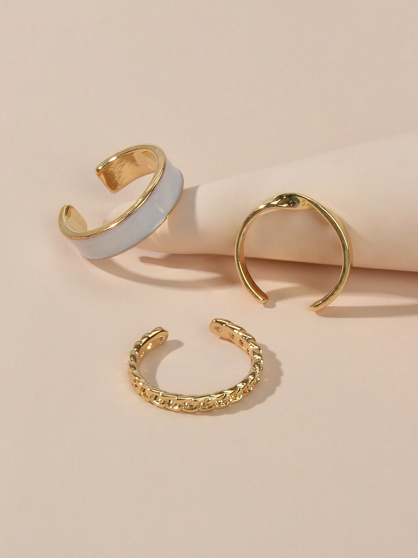 Three piece retro stackable white enamel midi knuckle ring set displayed together — view 4