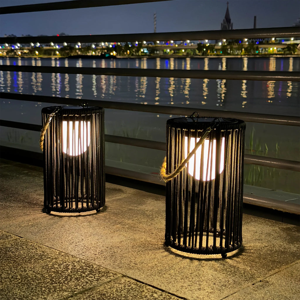 Two black metal 10.5 inch outdoor solar lanterns with rustic jute rope handles for garden lighting — view 4
