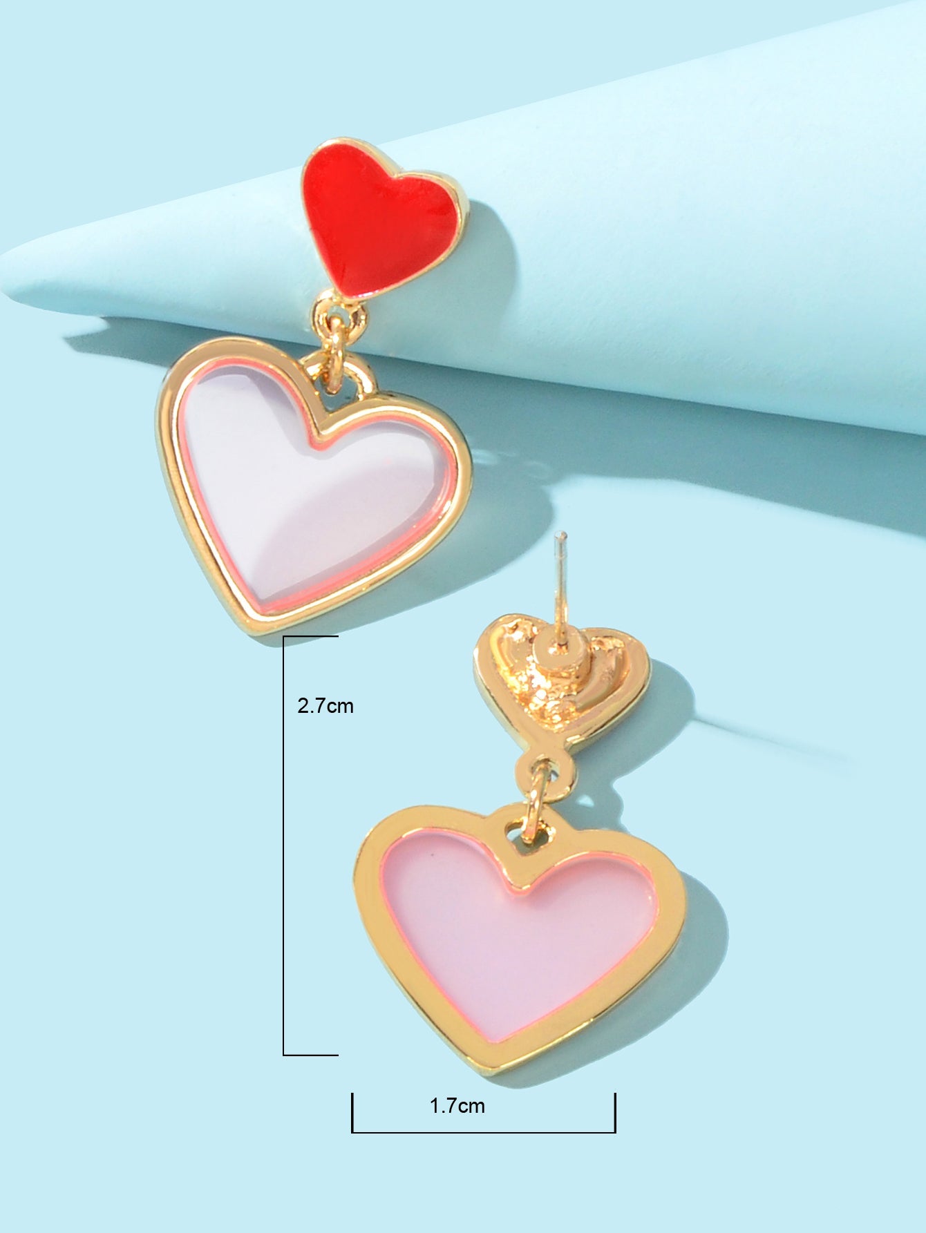 Elegant dangling love heart drop stud earrings for women on a clean background — view 4
