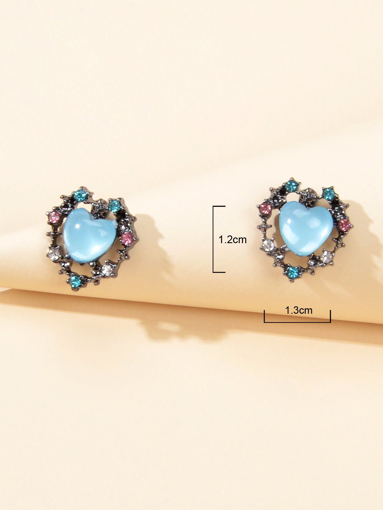 Retro blue opal heart stud earrings with colorful rhinestone halo on a clean background — view 4