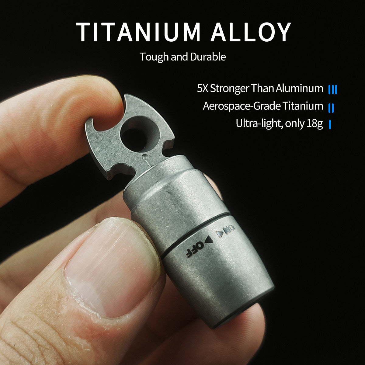 Titanium EDC keychain flashlight with integrated bottle opener attached to metal keyring on plain background — view 4