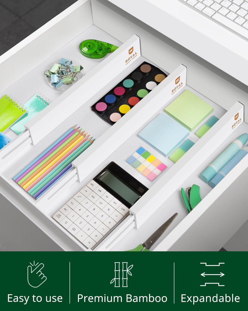 Adjustable 22 inch white bamboo drawer dividers organizing kitchen utensils in a drawer. — view 5