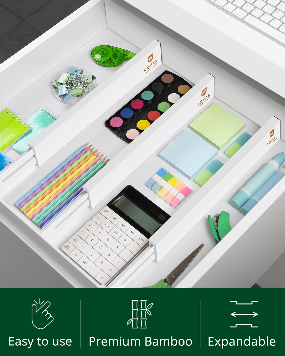 Adjustable 22 inch white bamboo drawer dividers organizing kitchen utensils in a drawer. — view 5