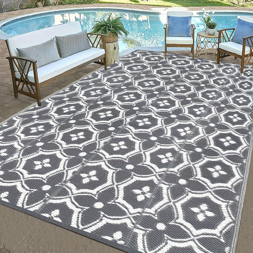 Outdoor reversible patio mat with large geometric pattern made of braided polypropylene for camping — view 4