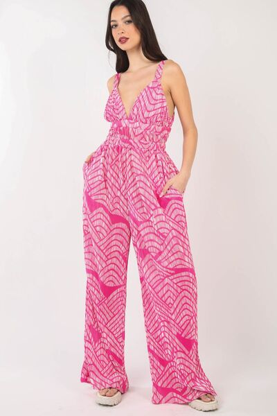 Women's printed pleated sleeveless wide leg jumpsuit in lightweight polyester with built-in side pockets — view 5