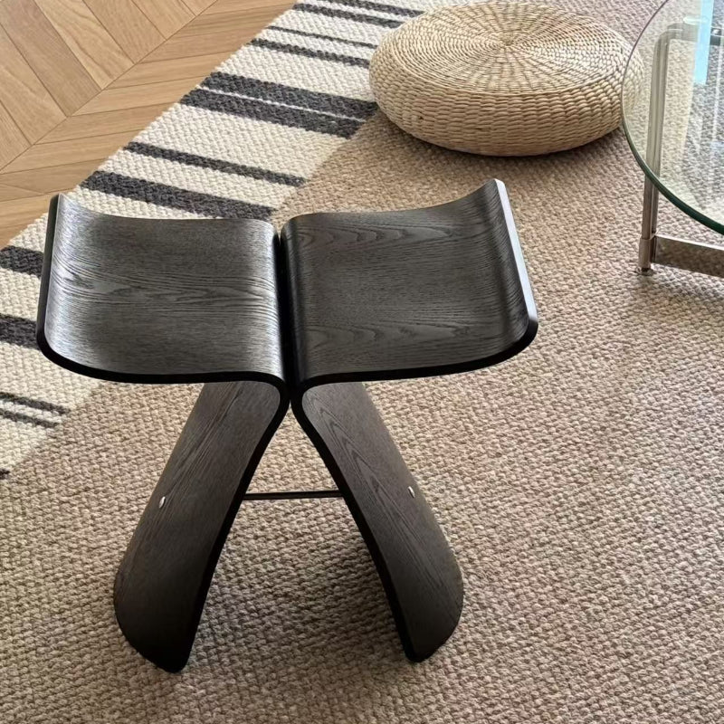 Sculptural wooden accent chair and multifunctional stool with a modern curved silhouette and natural grain finish — view 2